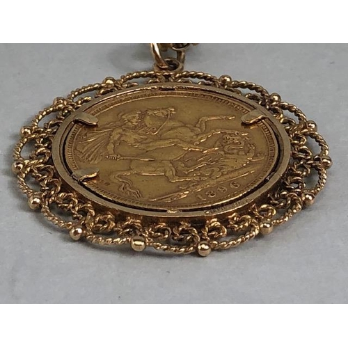 8 - Victorian full gold sovereign,1896, in a 9ct gold filagree mount, with chain (approximate weight of ... 