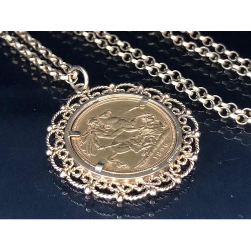 8 - Victorian full gold sovereign,1896, in a 9ct gold filagree mount, with chain (approximate weight of ... 