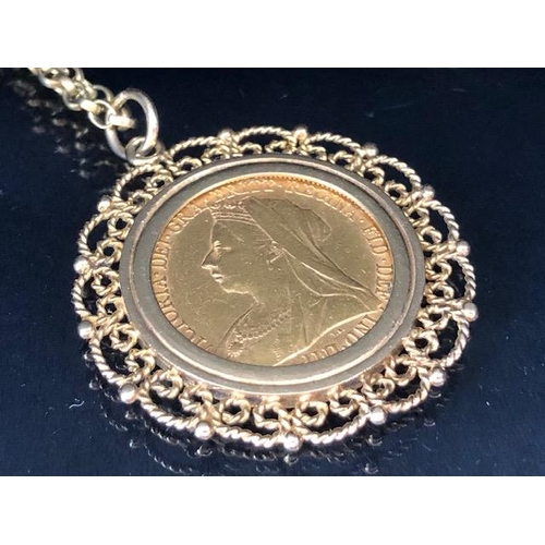 8 - Victorian full gold sovereign,1896, in a 9ct gold filagree mount, with chain (approximate weight of ... 