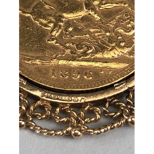 8 - Victorian full gold sovereign,1896, in a 9ct gold filagree mount, with chain (approximate weight of ... 