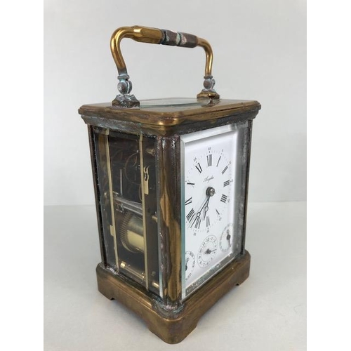 88 - Brass cased striking carriage clock  by Angelus Switzerland, brass case with glass panels, white fac... 