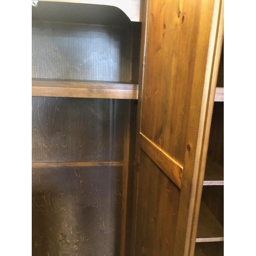 109 - Pine three Door wardrobe with shelves and hanging rail