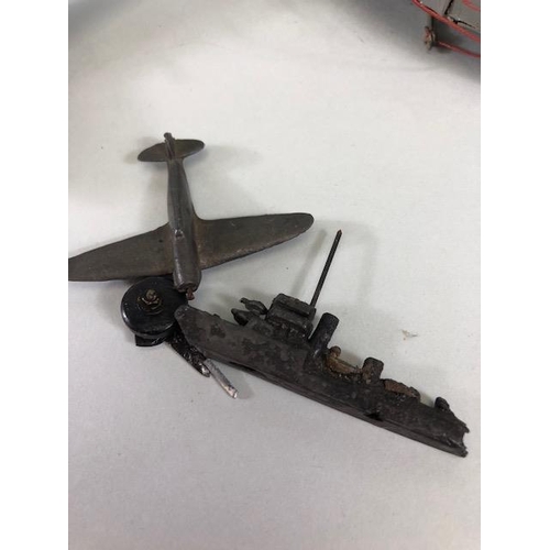 143 - Vintage toy and military interest, 2 war time scratch built carved fighter aircraft, a Royal Navy MT... 