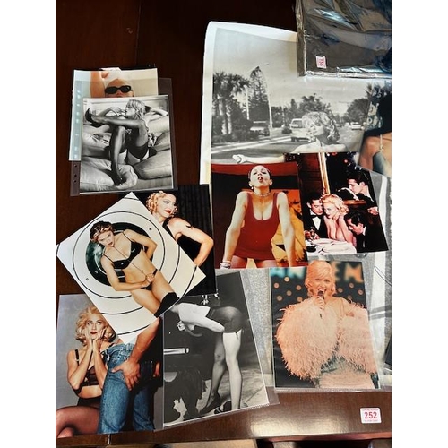 156 - Collection of Madonna, related memorabilia, to include a copy of her book sex along with posters and... 