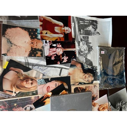 156 - Collection of Madonna, related memorabilia, to include a copy of her book sex along with posters and... 