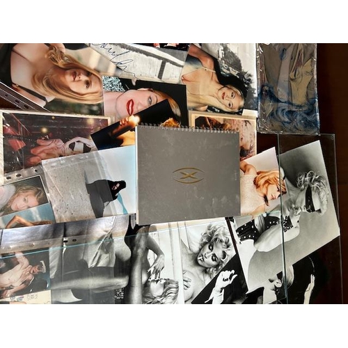 156 - Collection of Madonna, related memorabilia, to include a copy of her book sex along with posters and... 