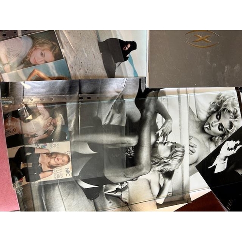 156 - Collection of Madonna, related memorabilia, to include a copy of her book sex along with posters and... 