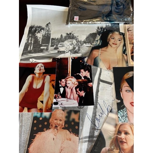 156 - Collection of Madonna, related memorabilia, to include a copy of her book sex along with posters and... 