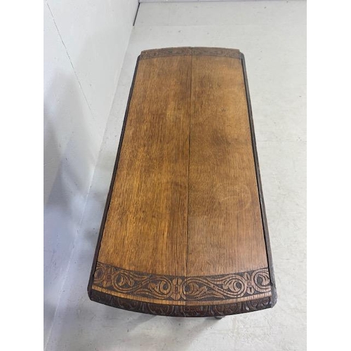 192 - Oak drop leaf table with carved edgework