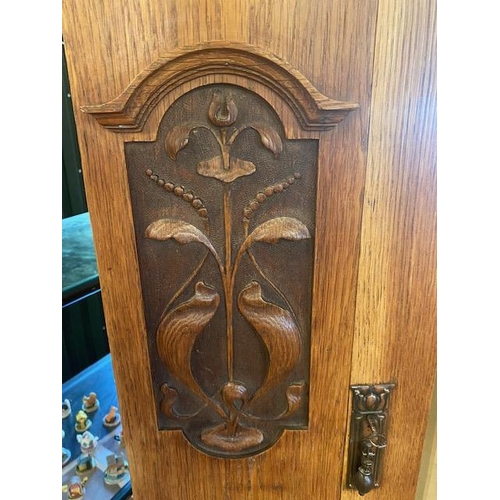 195 - Single wardrobe with door containing bevel edged mirror, carved art deco detailing and original key,... 