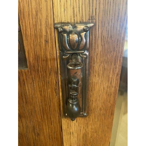 195 - Single wardrobe with door containing bevel edged mirror, carved art deco detailing and original key,... 