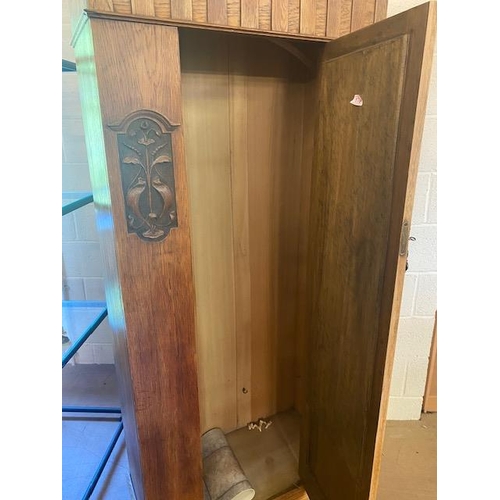 195 - Single wardrobe with door containing bevel edged mirror, carved art deco detailing and original key,... 