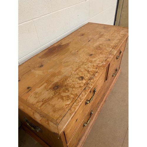 197 - Antique pine low chest of three drawers two short over one long with heavy brass handles approx 130 ... 