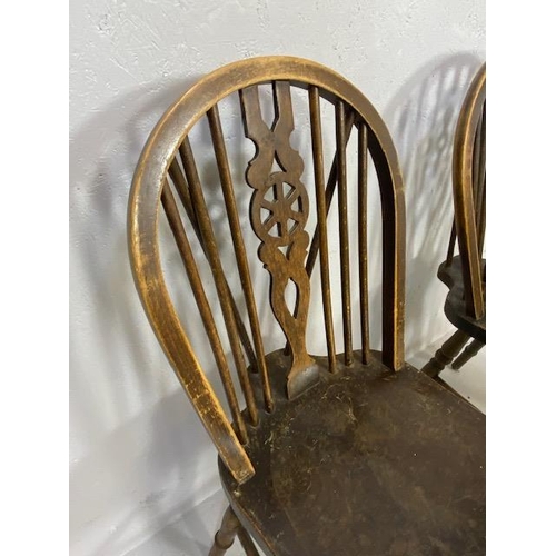 198 - Pair of wheel back chairs