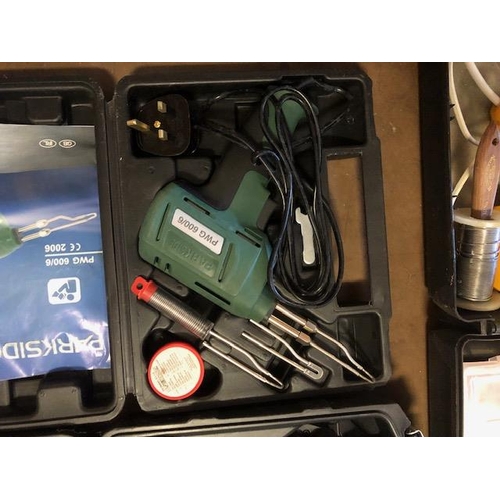 223 - Collection of boxed Power tools to include a BOSCH Router, Soldering kit, Drill sharpener etc