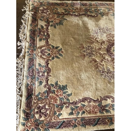 231 - Chinese  style wool rug of flowers on a cream back ground approximately 275 x 170