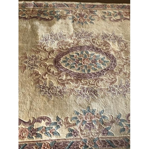 231 - Chinese  style wool rug of flowers on a cream back ground approximately 275 x 170