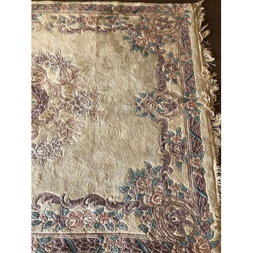 231 - Chinese  style wool rug of flowers on a cream back ground approximately 275 x 170