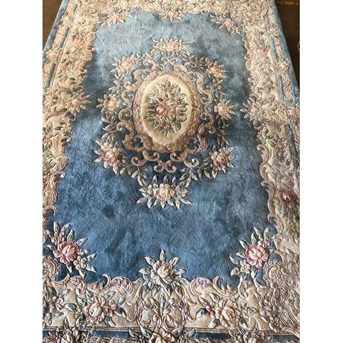 232 - Chinese style wool rug of flower design approximately 275 x 180cm