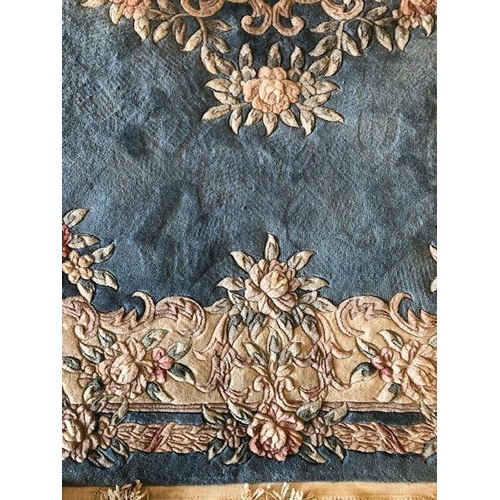 232 - Chinese style wool rug of flower design approximately 275 x 180cm