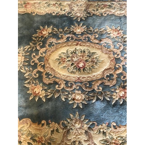 232 - Chinese style wool rug of flower design approximately 275 x 180cm