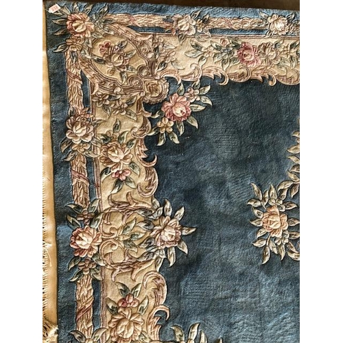 232 - Chinese style wool rug of flower design approximately 275 x 180cm