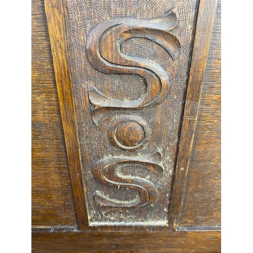 237 - Oak monks bench with sliding table top initials SS carved to back and front approximately 94 x 50 x ... 