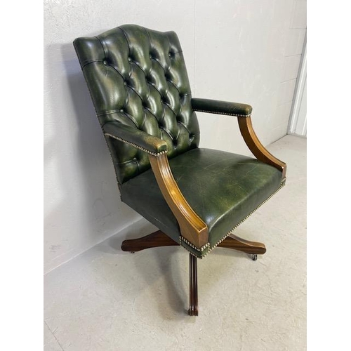 240 - Antique style button back  captains chair upholstered in green leather