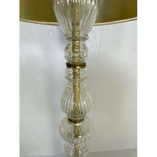 249 - Standard lamp base of fluted glass sections supported by 3 Iron scroll legs