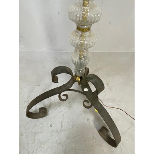 249 - Standard lamp base of fluted glass sections supported by 3 Iron scroll legs