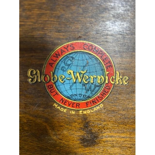 253 - Globe Wernicke three section graduated , glazed oak book case, Wernicke trade label in top section, ... 