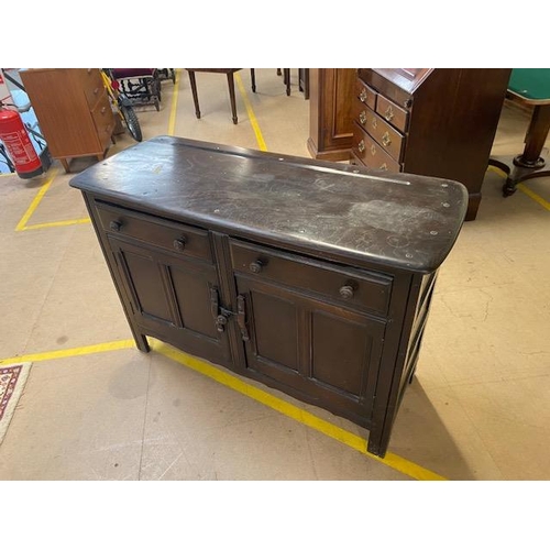 254 - Ercol mid 20th century dark elm dresser, two cupboards with two drawers above approximately 120 x 48... 