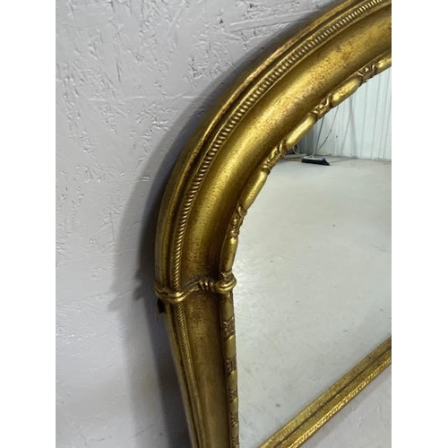 261 - Reproduction 19th century style  half round overmantel mirror,in a gilt finish frame approximately 1... 