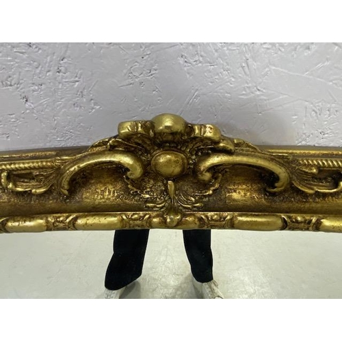 261 - Reproduction 19th century style  half round overmantel mirror,in a gilt finish frame approximately 1... 