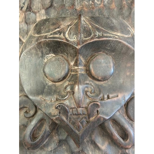 269A - Tribal interest, large hand carved  iron wood door panel, possibly Dyak Borneo, approximately 81 cm ... 