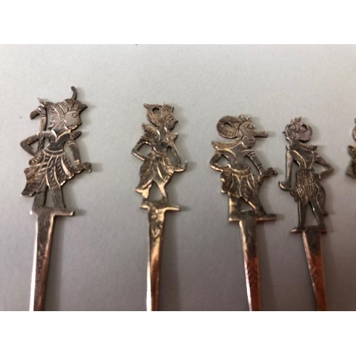 27 - Collection of unmarked silver cocktail sticks depicting Garuda, set of twelve