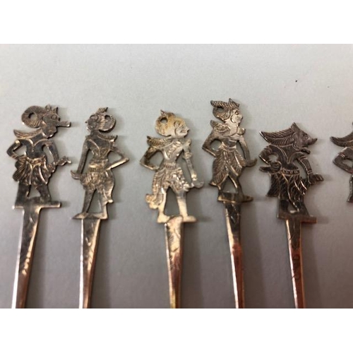 27 - Collection of unmarked silver cocktail sticks depicting Garuda, set of twelve