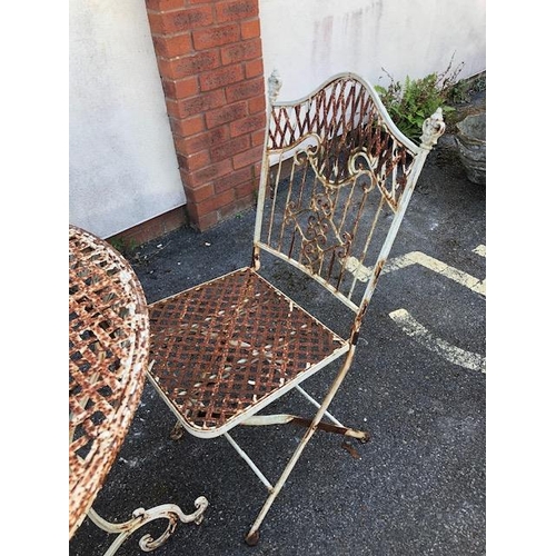 276 - French style metal painted Bistro Garden table and four chairs with ornate design, table approx 76cm... 