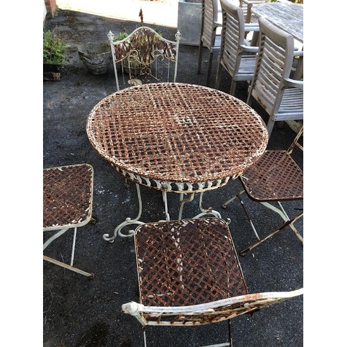 276 - French style metal painted Bistro Garden table and four chairs with ornate design, table approx 76cm... 