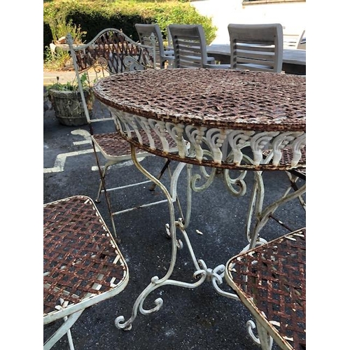 276 - French style metal painted Bistro Garden table and four chairs with ornate design, table approx 76cm... 