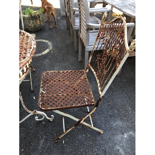 276 - French style metal painted Bistro Garden table and four chairs with ornate design, table approx 76cm... 