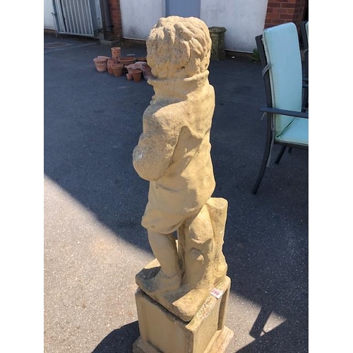 286 - Garden statue on Plinth of a boy approx 110cm tall