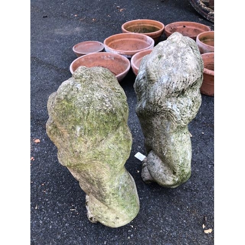 288 - Pair of Garden statues of seated Lions approx 48cm tall (2)