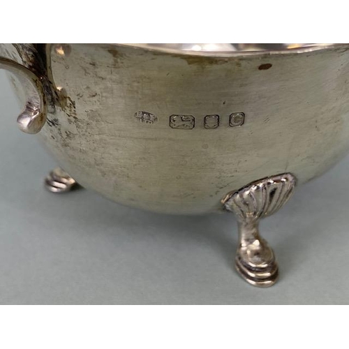 29 - English London  Silver hallmarked  sauce boat on three hoof feet approximately 97g