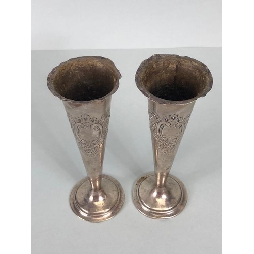 33 - English Silver, Pair of hallmarked  bud vases with Rococo style engraving weighted  bottoms each app... 