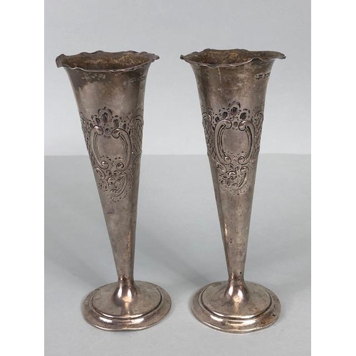 33 - English Silver, Pair of hallmarked  bud vases with Rococo style engraving weighted  bottoms each app... 