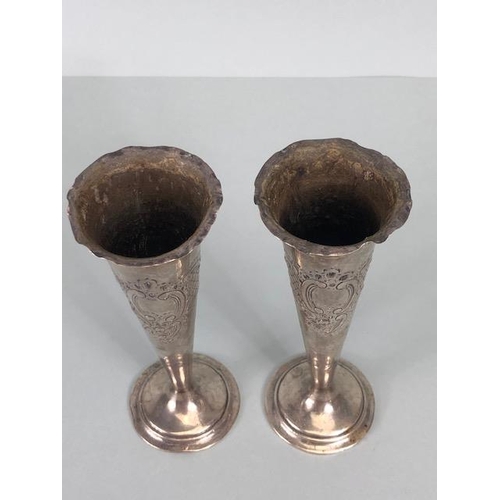 33 - English Silver, Pair of hallmarked  bud vases with Rococo style engraving weighted  bottoms each app... 