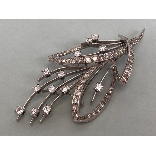 45 - White Gold contemporary styled Floral Spray brooch with Diamonds, Thirteen single set Diamonds in fo... 