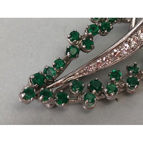 46 - 18ct White Gold twist Spray Brooch set with round brilliant cut diamonds and round cut Emeralds (pro... 