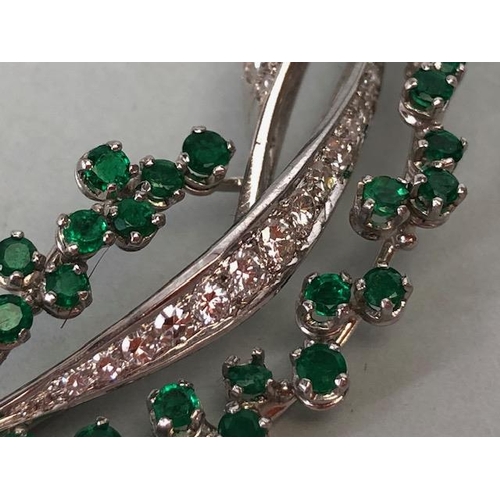 46 - 18ct White Gold twist Spray Brooch set with round brilliant cut diamonds and round cut Emeralds (pro... 